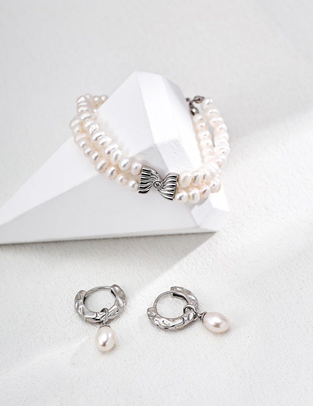 Double Pearl Strand Silver Bracelet with Sculpted Bow Centre