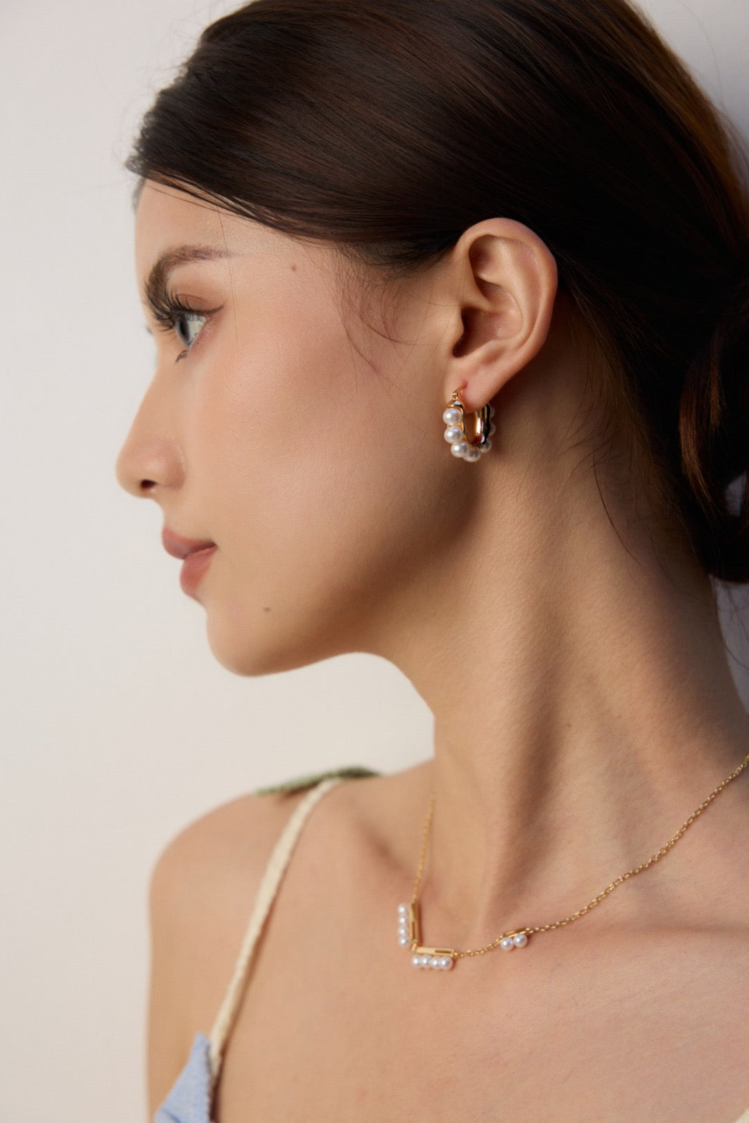 Pearl Hoop Silver Earrings with Sculpted Frame Design