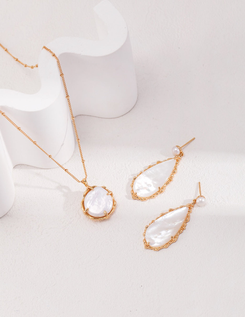 Shell Pearl Silver Drop Earrings with Organic Teardrop Design