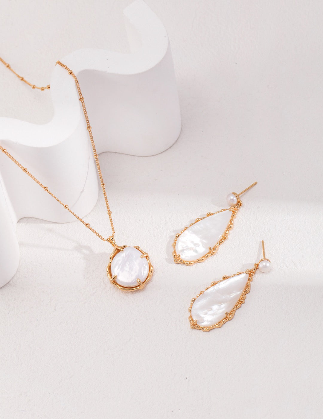 Shell Pearl Silver Drop Earrings with Organic Teardrop Design