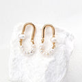 Natural Pearl Silver Hoop Earrings with Open Oval Design