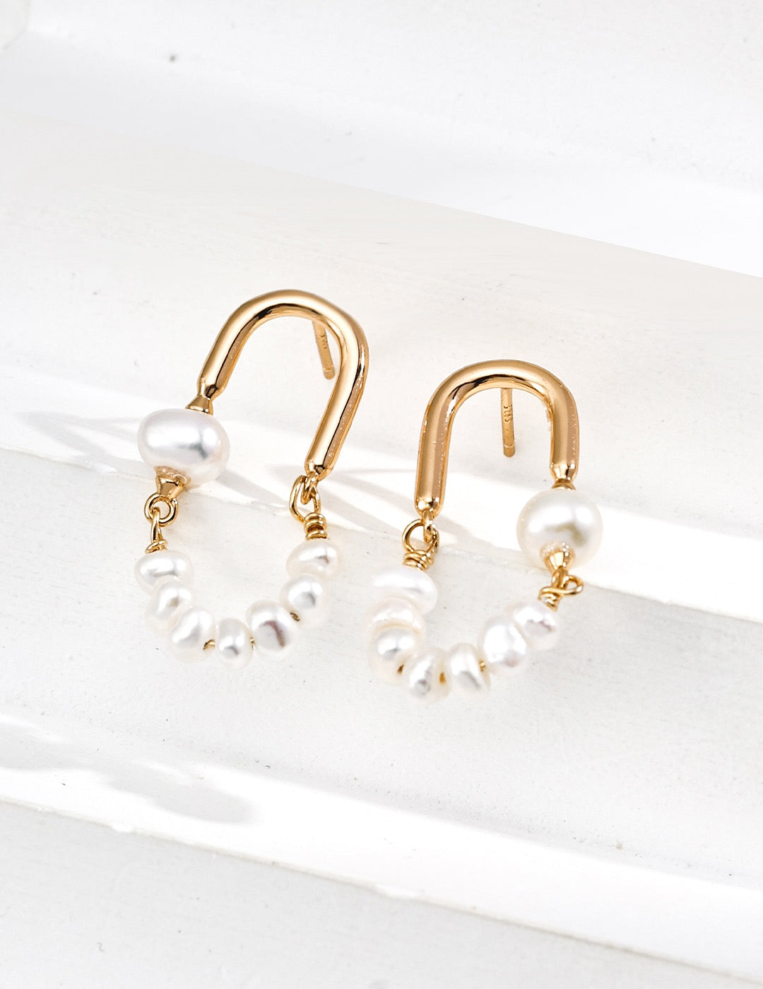 Natural Pearl Silver Hoop Earrings with Open Oval Design