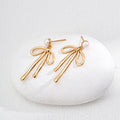 Pearl Bow Drop Earrings in Sterling Silver