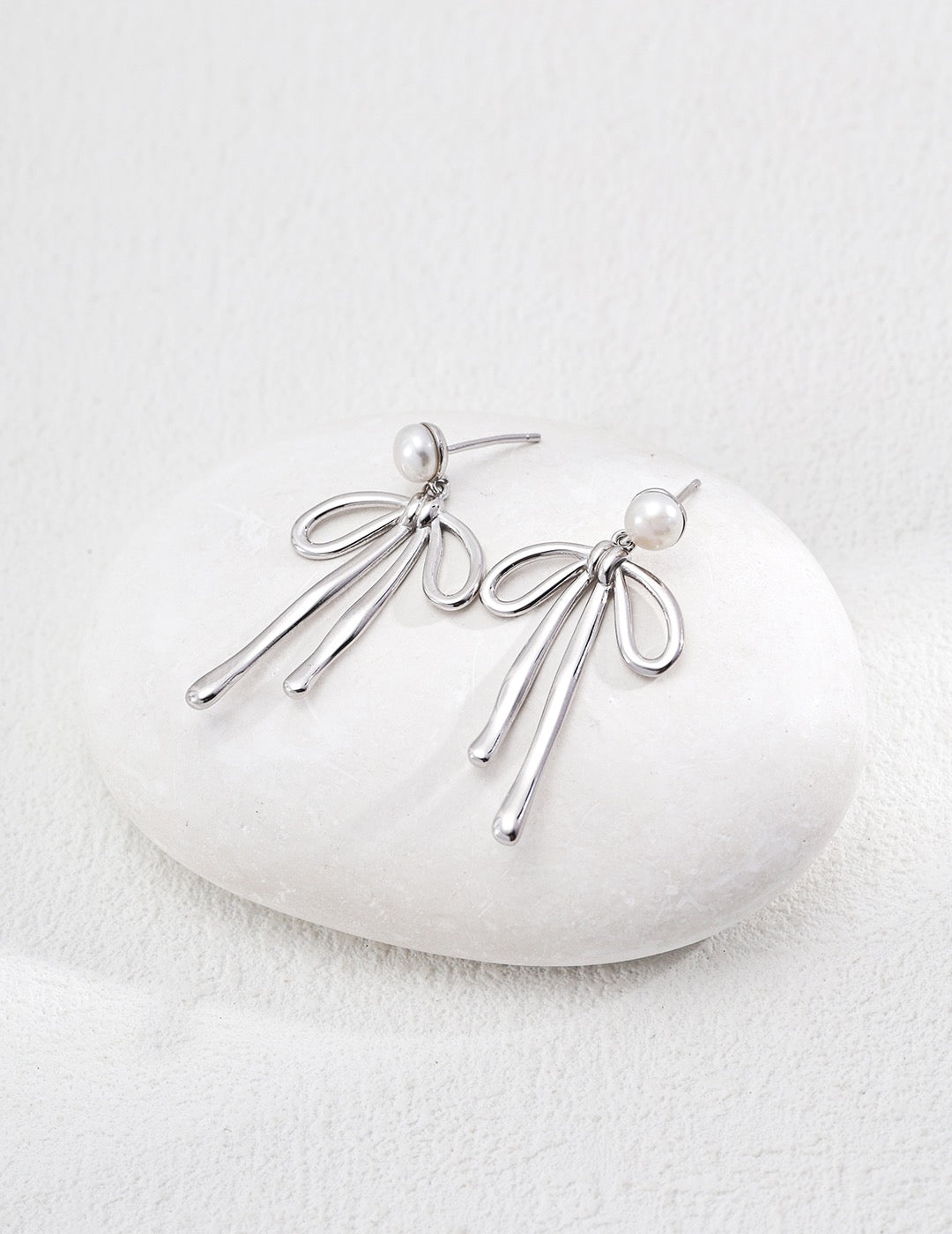 Pearl Bow Drop Earrings in Sterling Silver