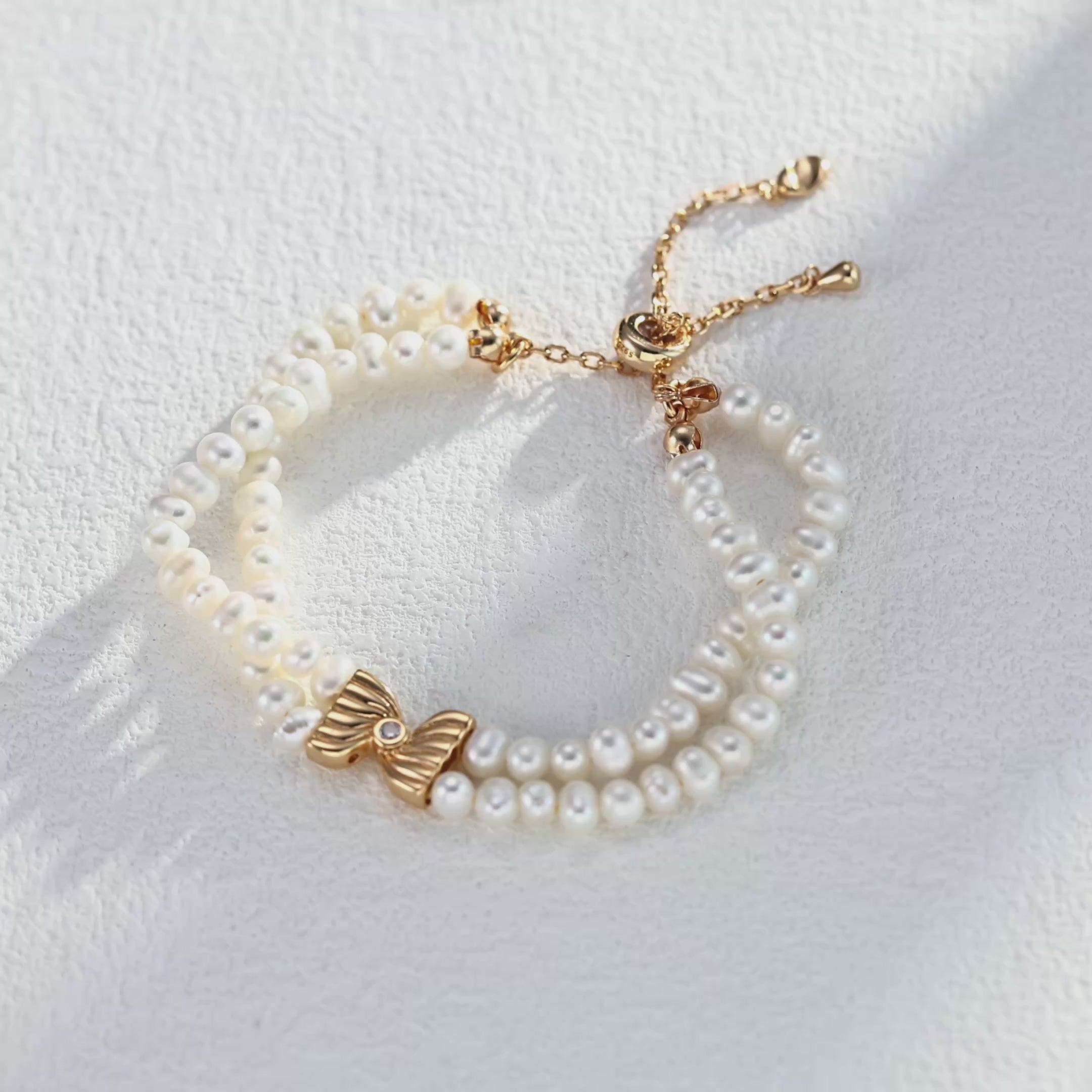 Double Pearl Strand Silver Bracelet with Sculpted Bow Centre